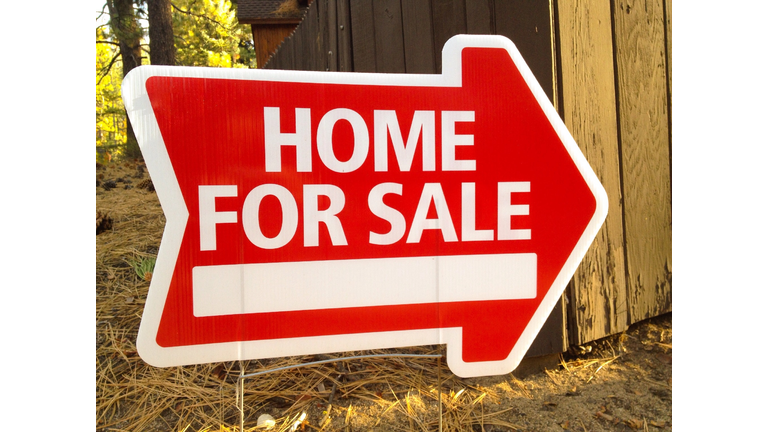 For Sale Arrow Sign On Ground