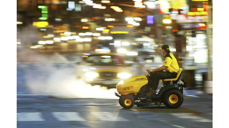 "Yard Man" Rides Lawnmower Cross Country