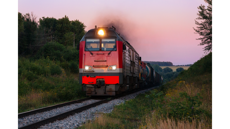 Powerful diesel locomotive hauling a heavy freight train