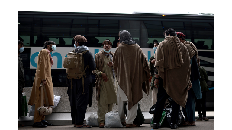 Afghan Refugees Arrive At Dulles Airport After US Pulls Out Final Troops