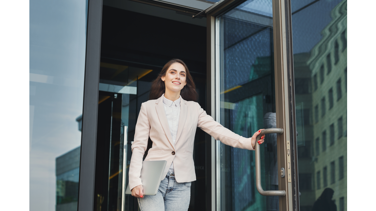 Confident young businesswoman talking on mobile