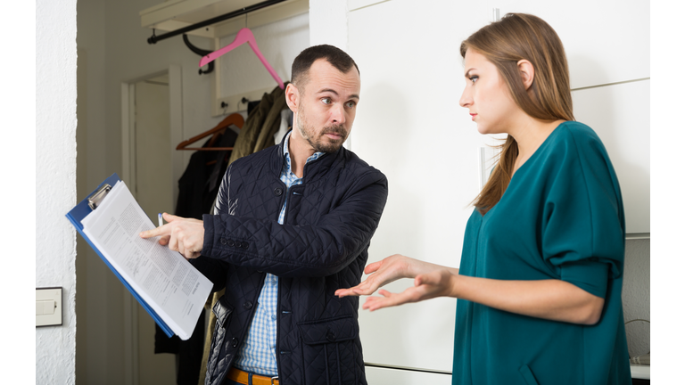 Frustrated woman talking to debt collector