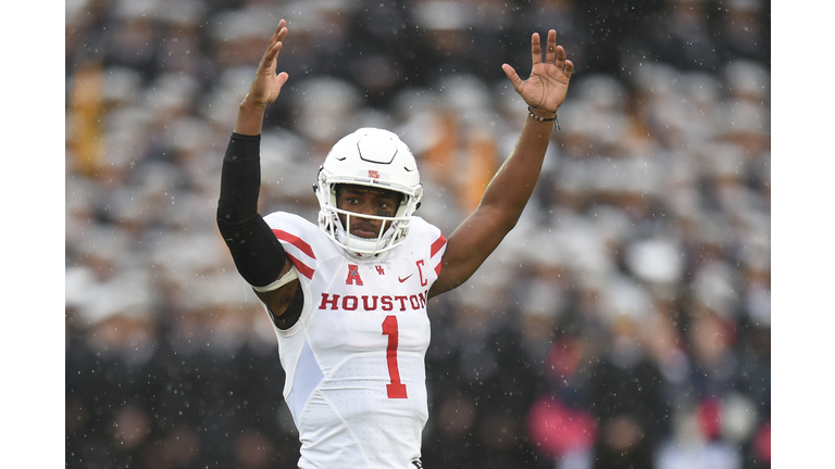 Greg Ward Jr. #1 of the Houston Cougars celebrates teams first touchdown in the first period a football game against the Navy Midshipmen at Navy-Marines Memorial Stadium on October 8, 2016 in Annapolis, Maryland. 