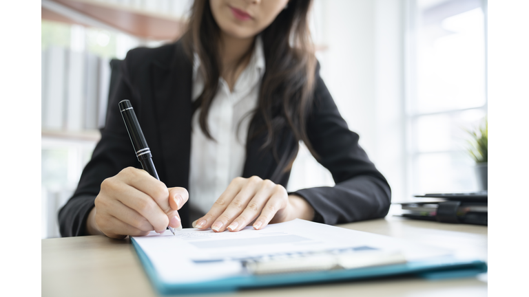 Business Signing a Contract