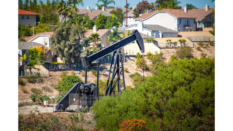 Oil pumpjack near homes in the Inglewood Oil Field.