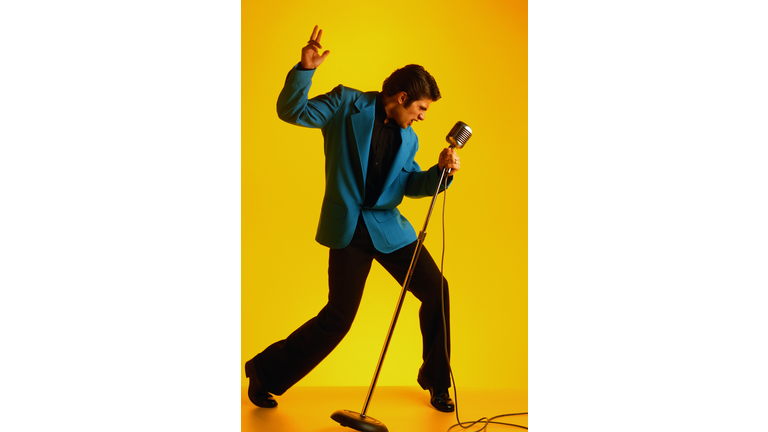 ELVIS IMPERSONATOR IN BLUE JACKET