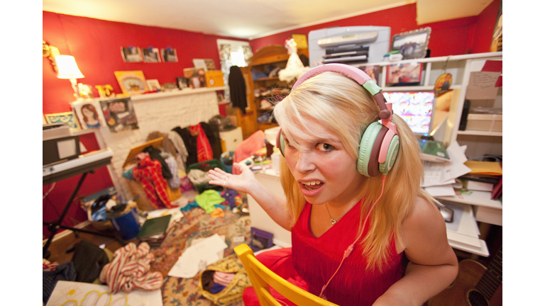 Teen girl in messy room