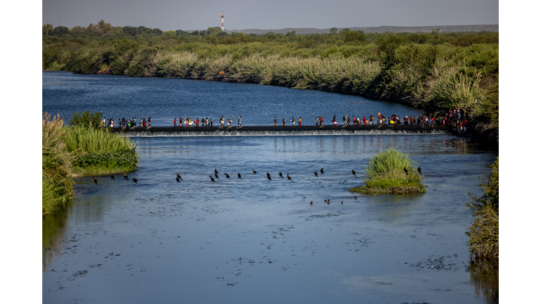 Large Migration Surge Crosses Rio Grande Into Del Rio, Texas