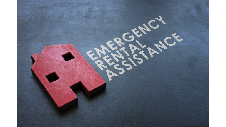 Emergency Rental Assistance Program ERAP. Red wooden home on the blackboard.