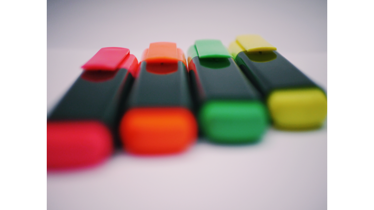Close-Up Of Highlighters On Gray Background