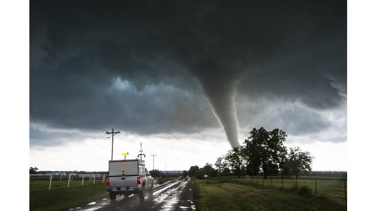 Storm vehicle with the Center for Severe Weather Research driving into the path of tornado with winds of 166 to 175 miles per hour, in Katie, Oklahoma