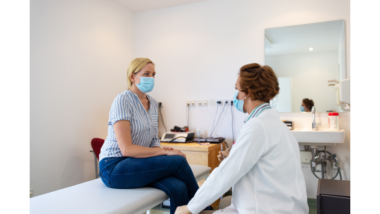 Woman visiting doctor during pandemic