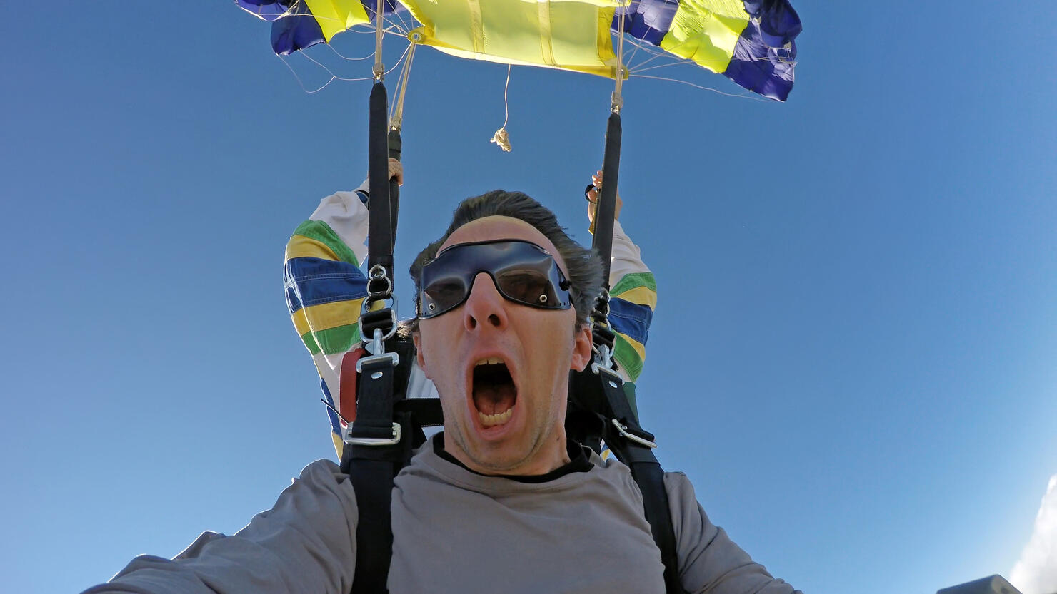 Skydivers open the parachute