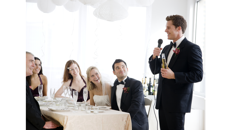 Best man giving speech at wedding
