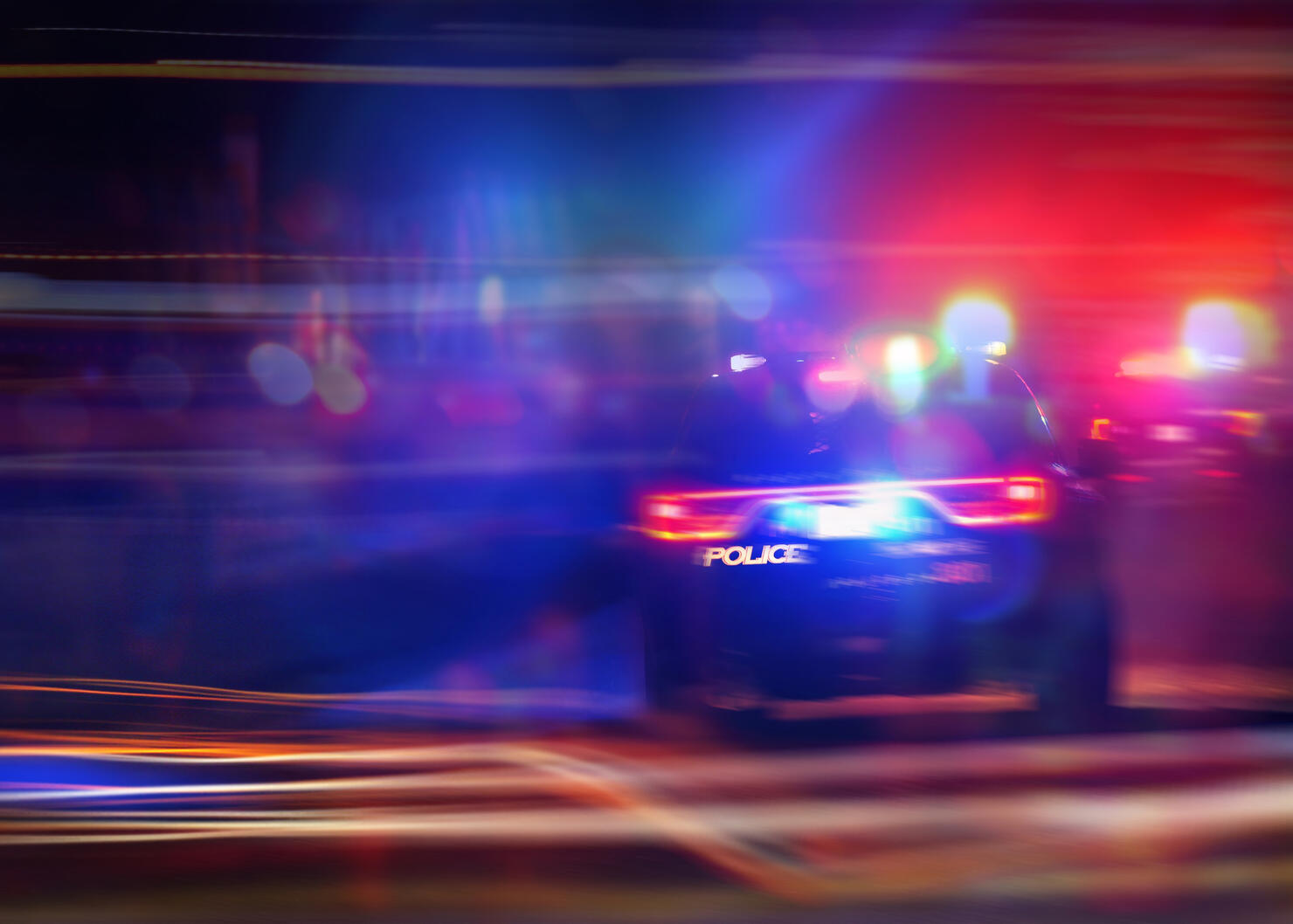 911 Emergency response police car speeding to scene of crime. Selective focus