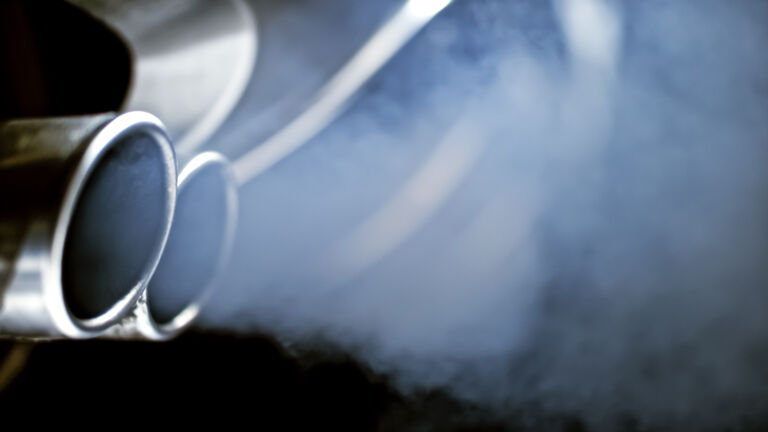 Close-up of car exhaust pipe