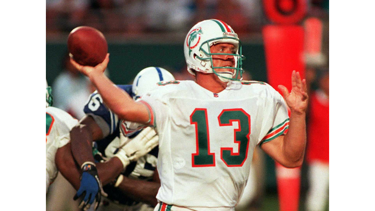 Quarterbacks John Dutton and Dan Marino of the Miami Dolphins talk News  Photo - Getty Images