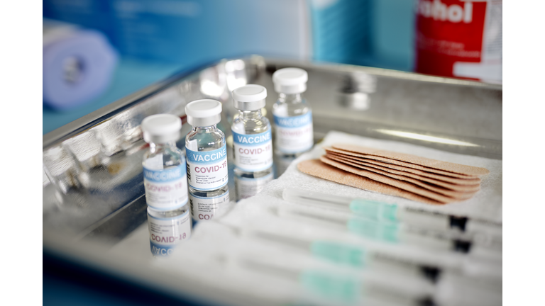 Vials With the Covid-19 Vaccine and Syringes are Displayed On a Tray at the Corona Vaccination Center