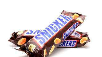 Man Gets His Dying Wish And Is Buried In A Snickers-Themed Coffin