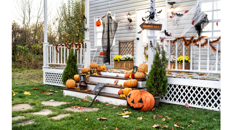 Halloween Jack-o-Lantern Pumpkins on a porch stairs