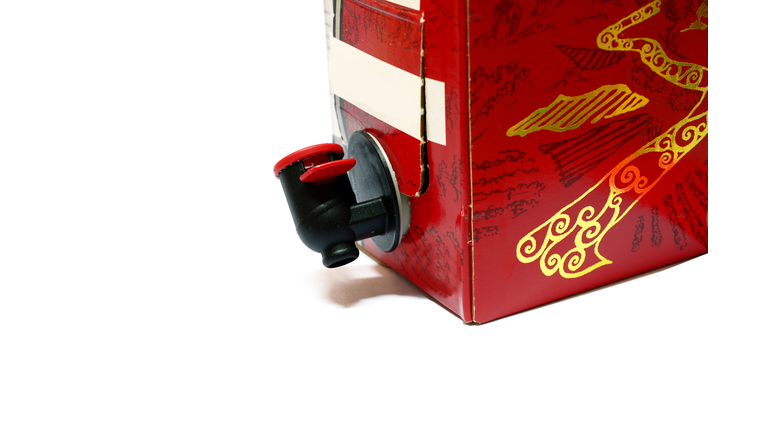 a paper box of red wine with black cock on white background isolated