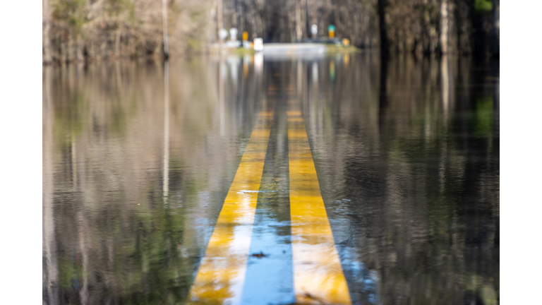 Flooded road underwater after heavy rain storm