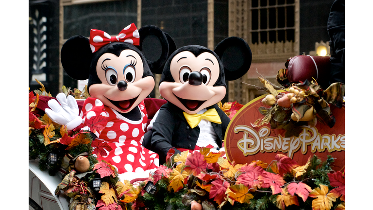 Minnie and Mickey Mouse ride Disney Parks float