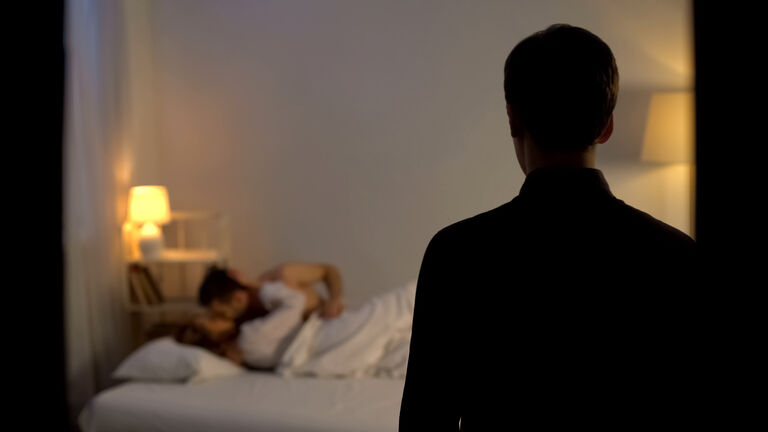 Husband catching his wife cheating with lover in bed, finding out adultery