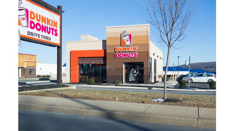 Dunkin' Donuts sign. Dunkin' Donuts is an American global doughnut company and coffeehouse chain.