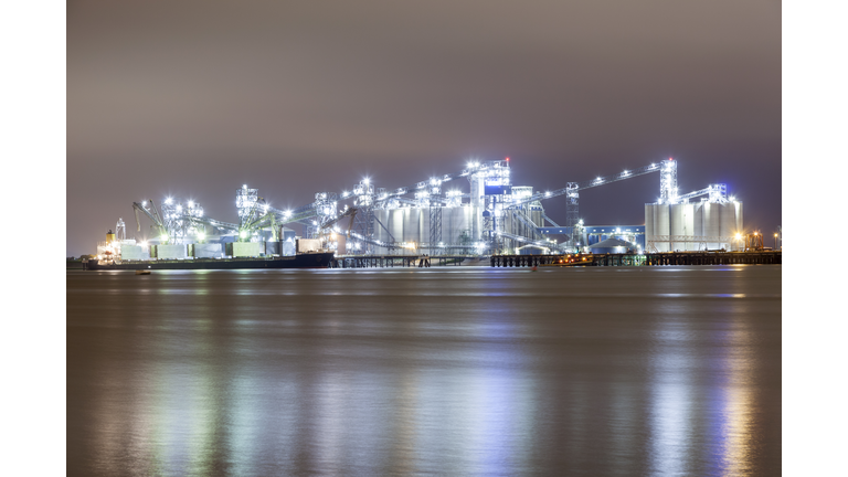 Refinery illuminated at night