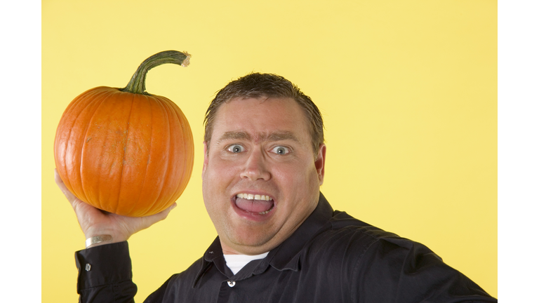 Man ready to lob a pumpkin