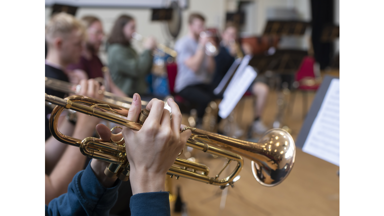 trumpet playing at a school rehearsal