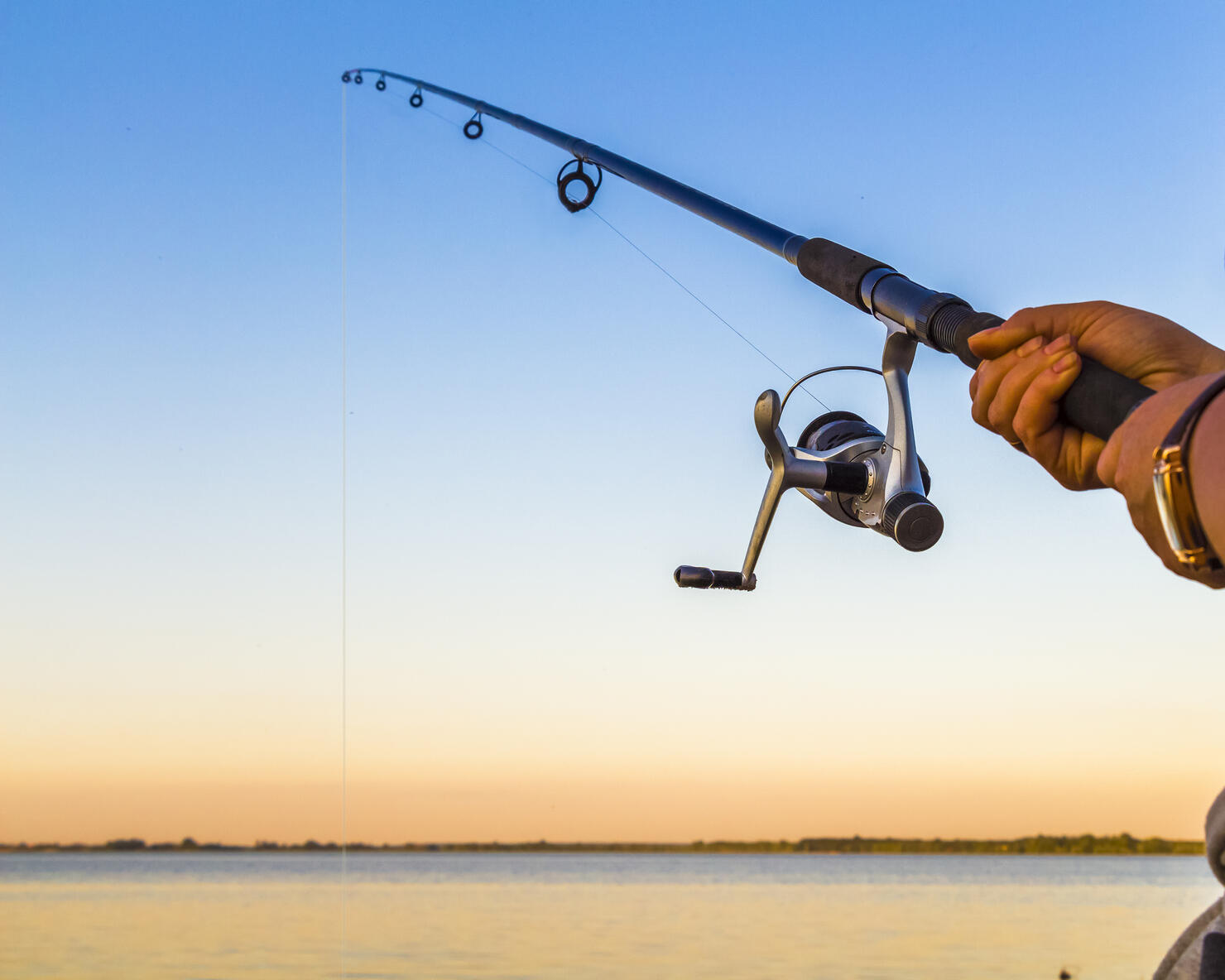 Fisherman with a fishing rod