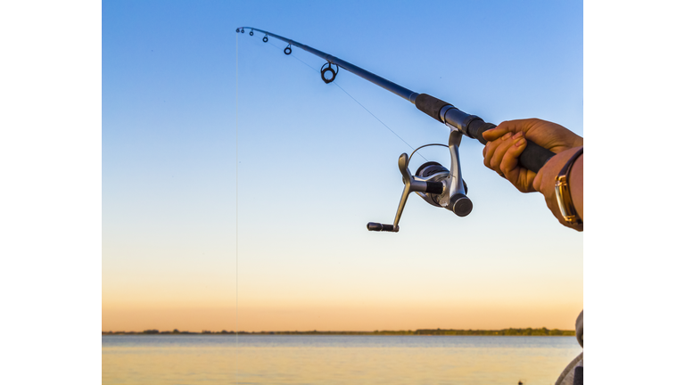 Fisherman with a fishing rod