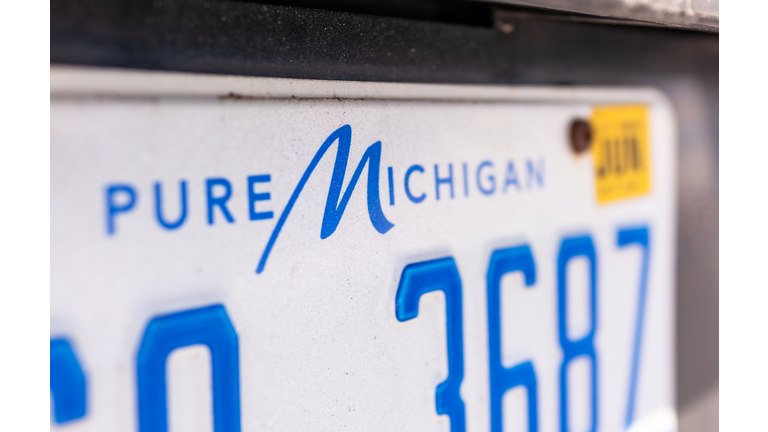 Michigan state vehicle license plate close-up