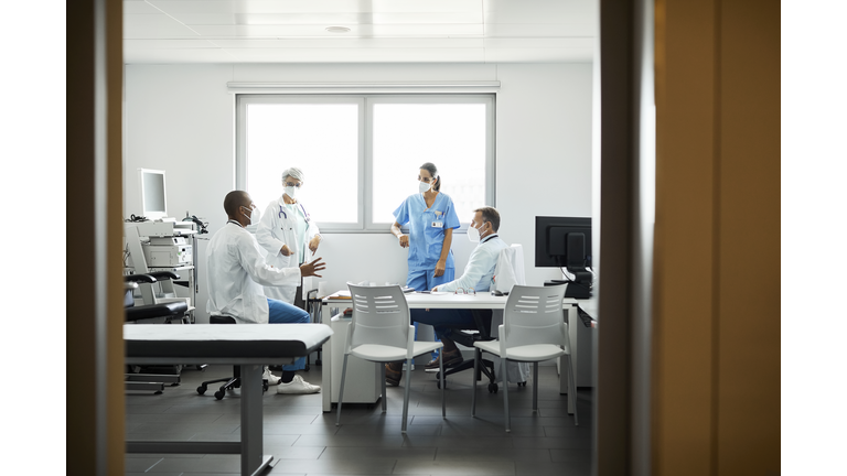 Healthcare professionals discussing in hospital