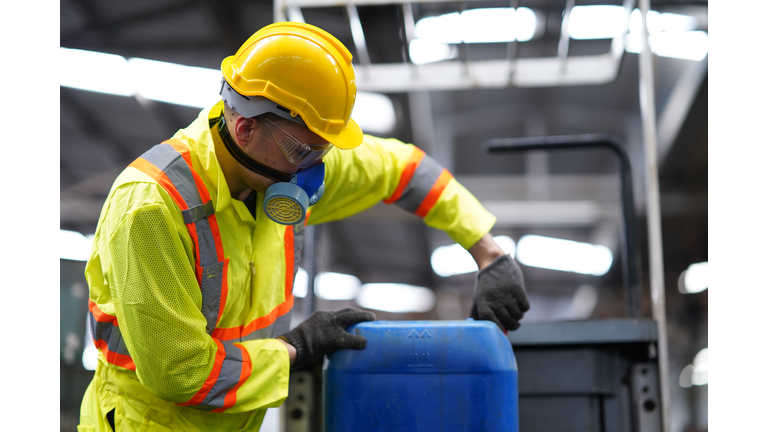 Factory worker working in the risk toxic waste