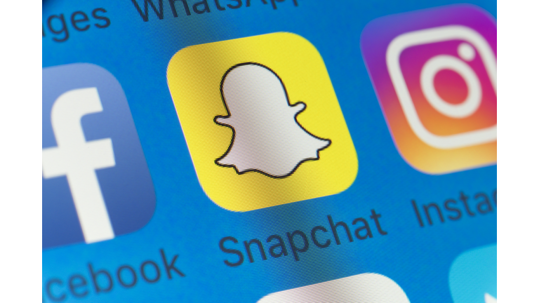 Snapchat, Facebook, Instagram and other cellphone Apps on iPhone screen