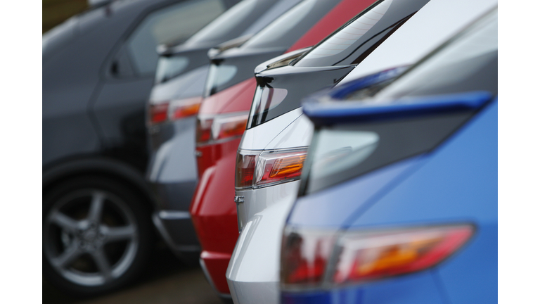 Honda Accord cars sit on the forecourt o