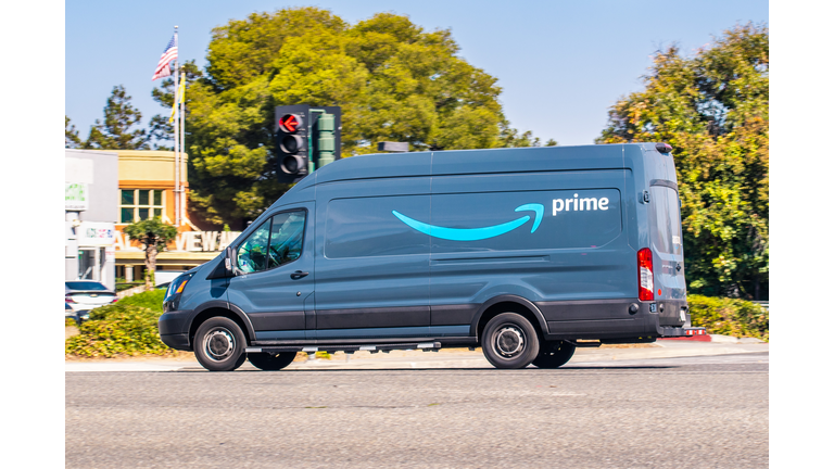 Amazon van making deliveries