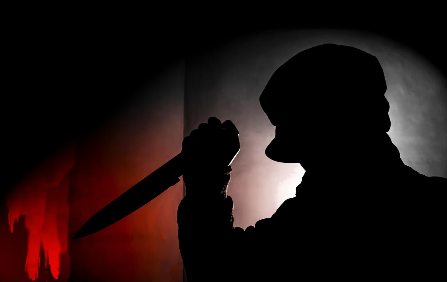 shadow man with knife