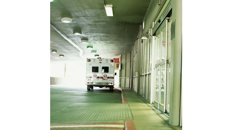 Ambulance in front of hospital entry way