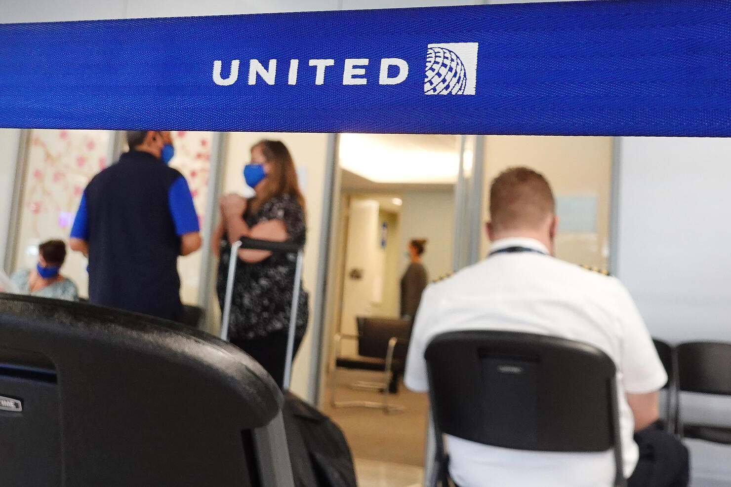 United Airlines Employees Receive COVID-19 Vaccination At O'Hare Airport