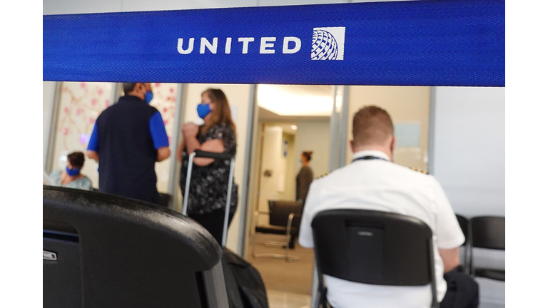 United Airlines Employees Receive COVID-19 Vaccination At O'Hare Airport