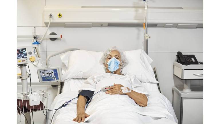 Woman on ventilator in hospital during COVID-19