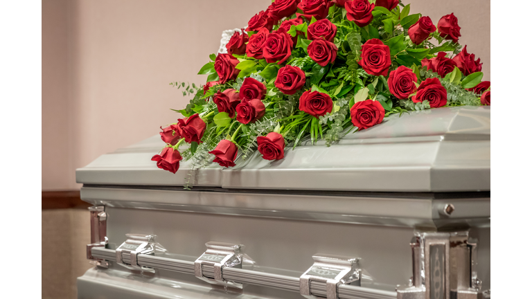 Roses on Top of Funeral Casket