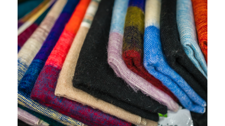 Colorful textures of scarves and blankets
