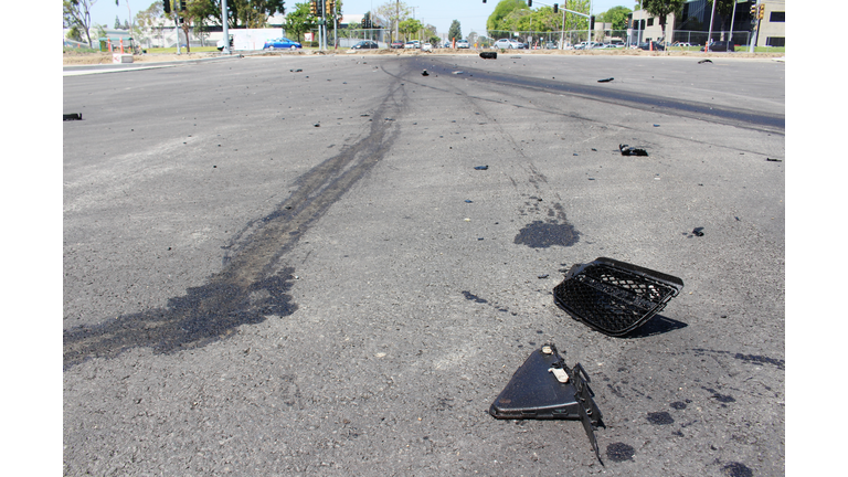 Broken Pieces from a Crashed Car that ran through a construction fence and boundary