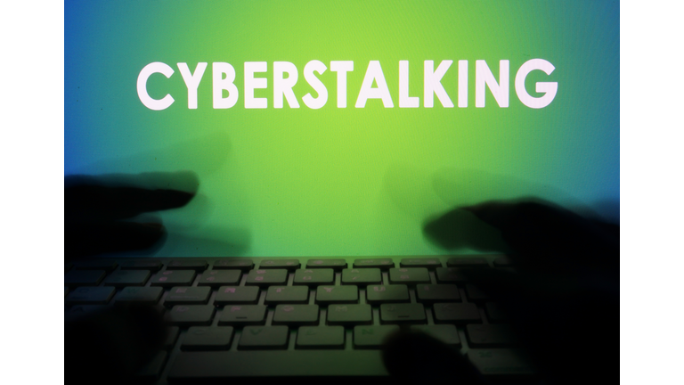 Cyberstalking on a monitor and a keyboard.