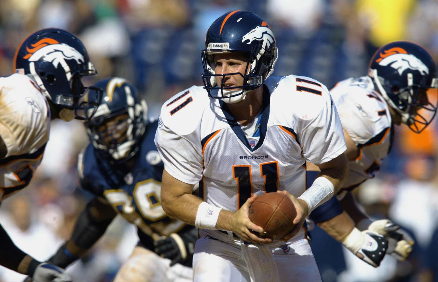 Steve Beuerlein hands off the ball